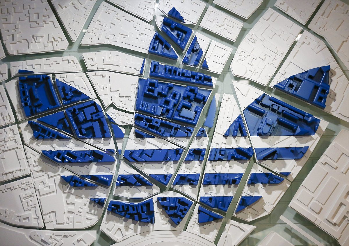The Adidas logo on a 3D city map is pictured at the flagship store in Berlin ...