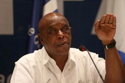Sexwale, chairman of the FIFA Monitoring Committee Israel-Palestine, gestures during a news conference with Israel Football Association president Eini and Al Rajoub, President of Palestinian Football Association, in Jericho