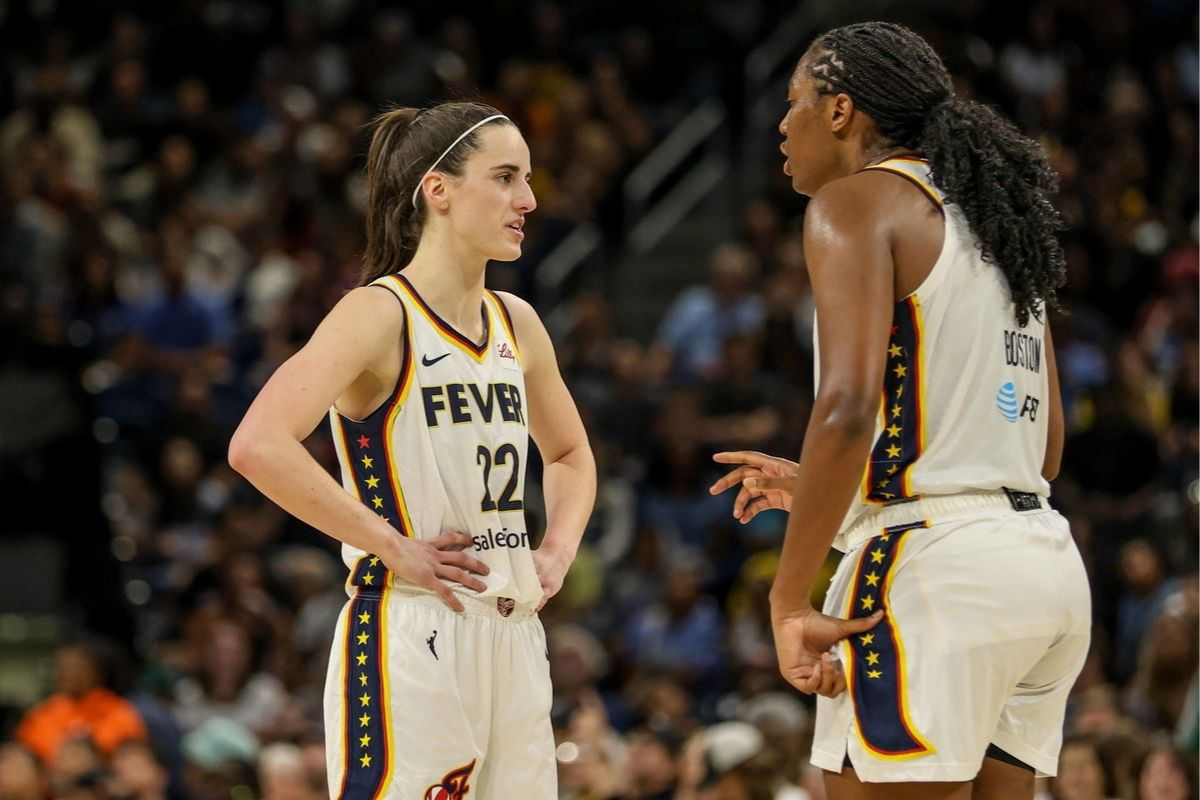 Chicago, USA, June 23, 2024: Caitlin Clark (22 Indiana Fever) speaks with Aliyah Boston (7 Indiana Fever) during the gam
