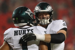 KANSAS CITY, MO &#8211; NOVEMBER 20: Philadelphia Eagles center Cam Jurgens (51) and quarterback Jalen Hurts (1) hug before an