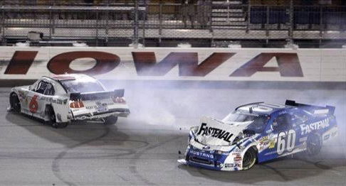 Ricky Stenhouse Jr. (6) and Carl Edwards (60) slow after crossing the finish line of the NASCAR Nationwide Series auto race Saturday, Aug. 6, 2011, at Iowa Speedway in Newton, Iowa. Stenhouse won the race and Edwards finished in second place