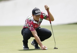 Viktor Hovland of Norway lines upon a putt on the 13th green in the first round of the Masters Tournament at Augusta Nat