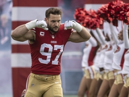 San Francisco 49ers defensive end Nick Bosa (97) flexes during introductions before playing the Arizona Cardinals at Lev