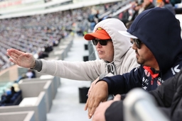 LAS VEGAS, NV &#8211; MARCH 05: A fan points towards the track during the NASCAR, Motorsport, USA Cup Series Pennzoil 400 pres