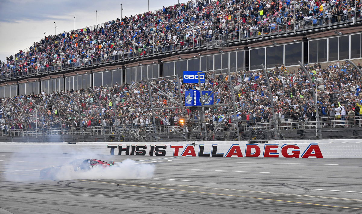 LINCOLN, AL &#8211; APRIL 23: Kyle Busch (8) does a burnout in the McLaren Custom Grills Chevrolet after winning the GEICO 500
