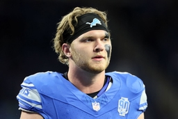 Carolina Panthers vs Detroit Lions Defensive end Aidan Hutchinson (97) of the Detroit Lions walks on the field ahead of