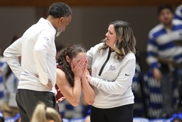 DURHAM, NC &#8211; JANUARY 18: Virginia Tech Hokies guard Georgia Amoore (5) covers her face after a hard foul during the coll
