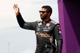 NASHVILLE, TN &#8211; JUNE 30: Bubba Wallace ( 23 23XI Racing Columbia Sportswear Company Toyota) waves to the fans prior to t