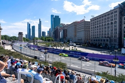 CHICAGO, IL &#8211; JULY 06: A view of the Chicago Street Race from the stands overlooking the skyline as drivers race through