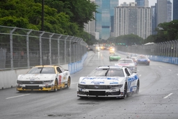 July 7, 2024, Chicago, Il, USA: NASCAR, Motorsport, USA Cup Series driver, Chris Buescher races for position for the Gra