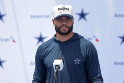 OXNARD, CA &#8211; JULY 25: Dallas Cowboys quarterback Dak Prescott (4) speaks with reporters during the team s training camp