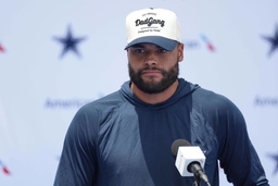 OXNARD, CA &#8211; JULY 25: Dallas Cowboys quarterback Dak Prescott (4) speaks with reporters during the team s training camp