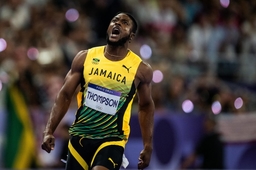 240804 Kishane Thompson of Jamaica reacts at the finish line of men™s athletics 100 meter final during day 9 of the Pari