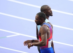 (240808) &#8212; PARIS, Aug. 8, 2024 &#8212; Noah Lyles (L) of the United States and Letsile Tebogo of Botswana react after the me
