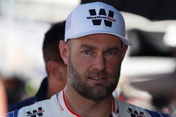 CHARLOTTE, NC &#8211; OCTOBER 12: Shane Van Gisbergen ( 97 Kaulig Racing WeatherTech Chevrolet) talks with his crew during qua