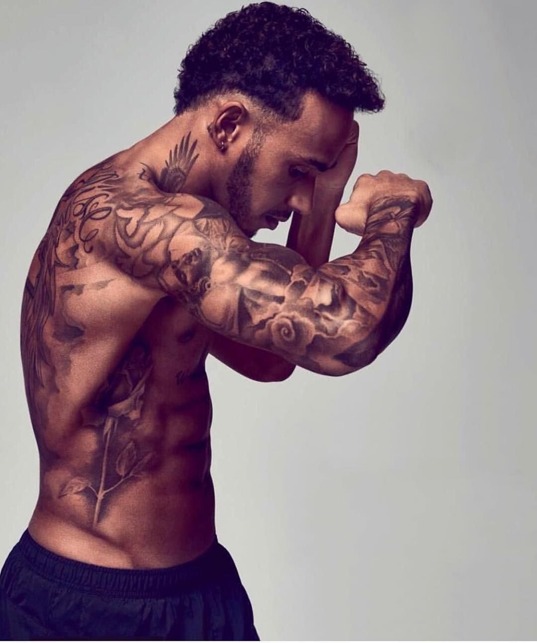 Lewis Hamilton Adds New Ink to His Collection with Fine Line Hand Tattoos